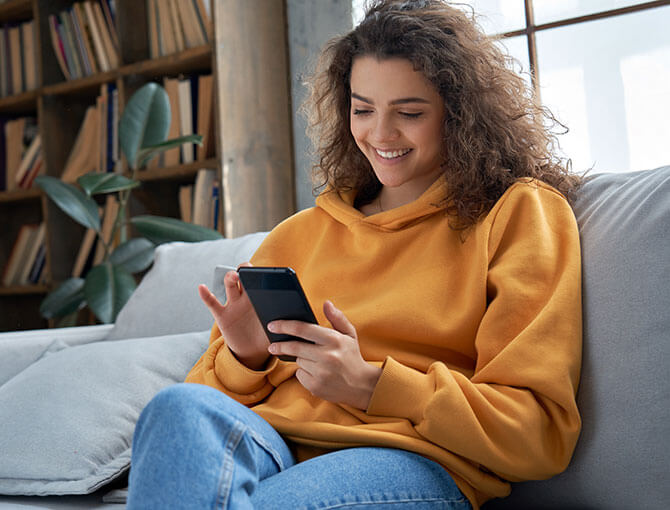 Mental health patient requests appointment online on her mobile device.